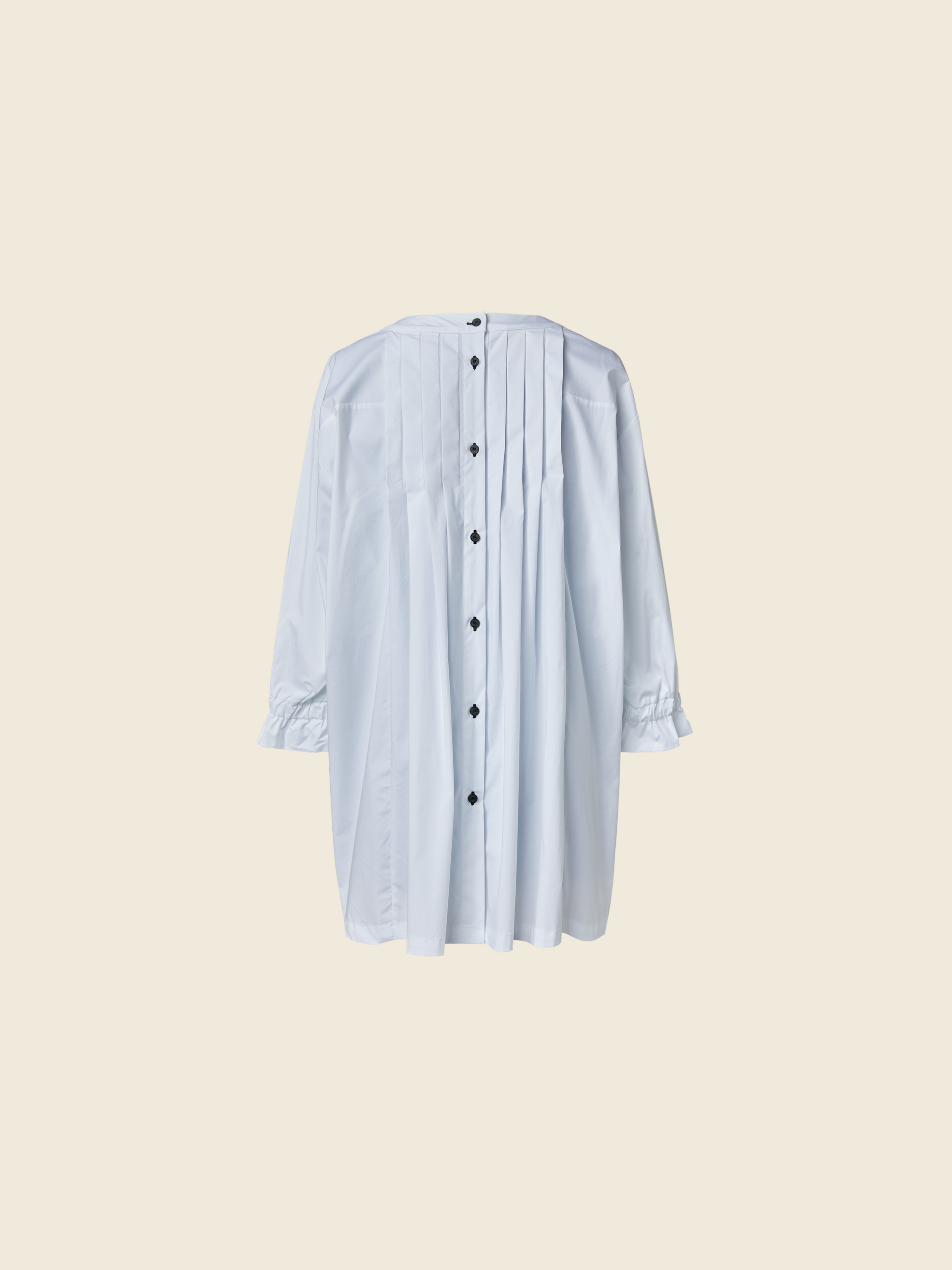 SHIRT WITH FOLDS AND BACK CLOSURE