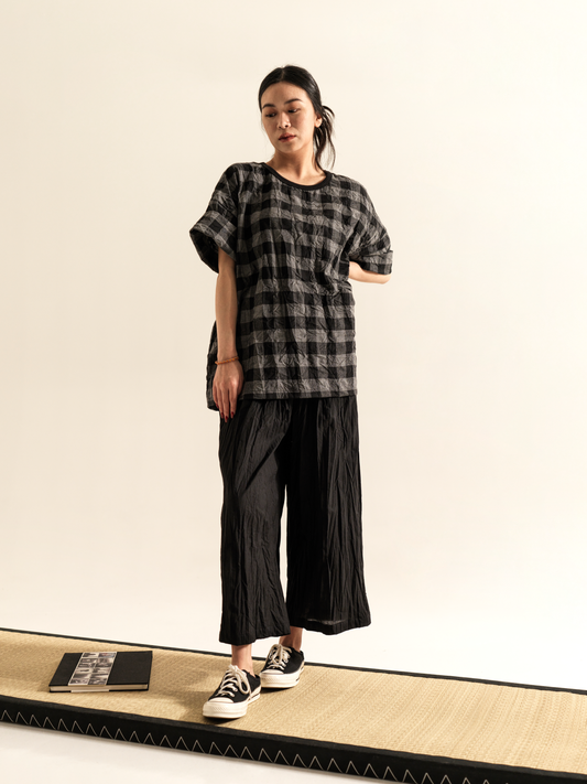 WRINKLED EFFECT TROUSERS WITH FRONT FOLD