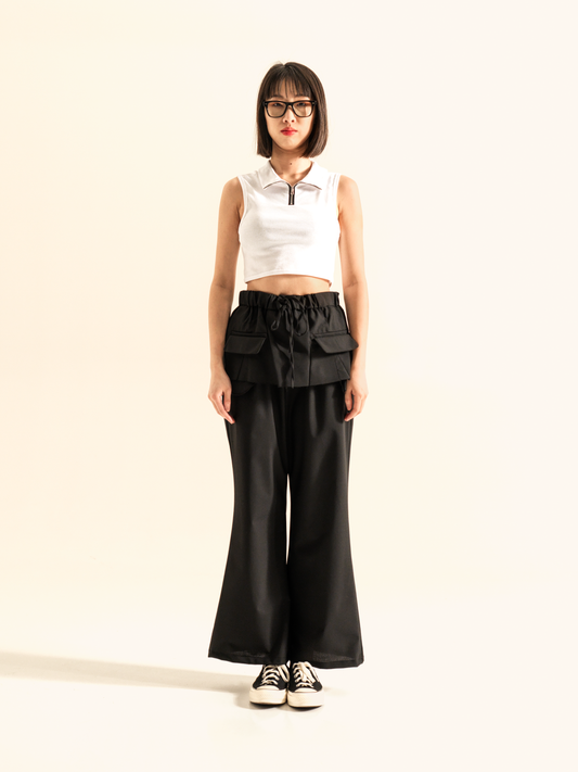 TROUSERS WITH FAKE SKIRT OVERLAYED
