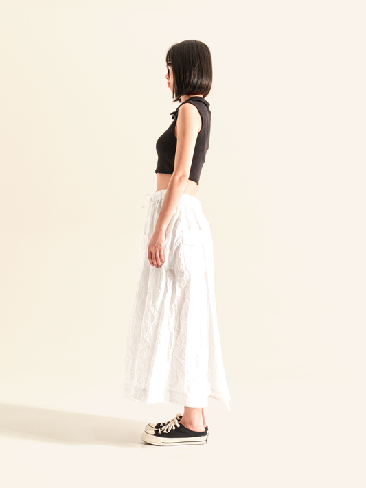 SKIRT WITH PLEAT ON THE FRONT AND BACK IN WRINKLED EFFECT FABRIC