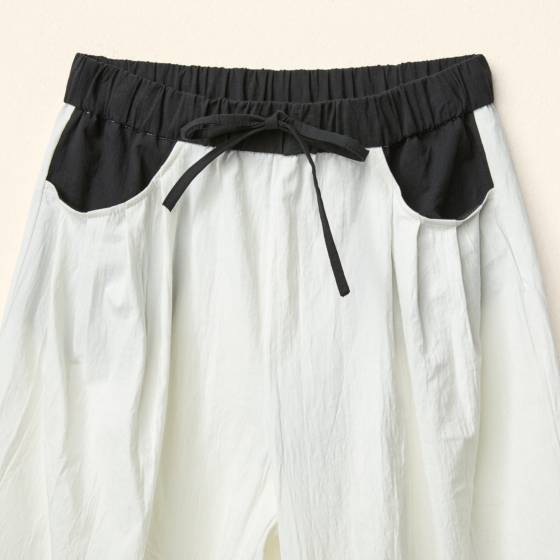 TROUSERS WITH CONTRASTING ELASTIC WAISTBAND