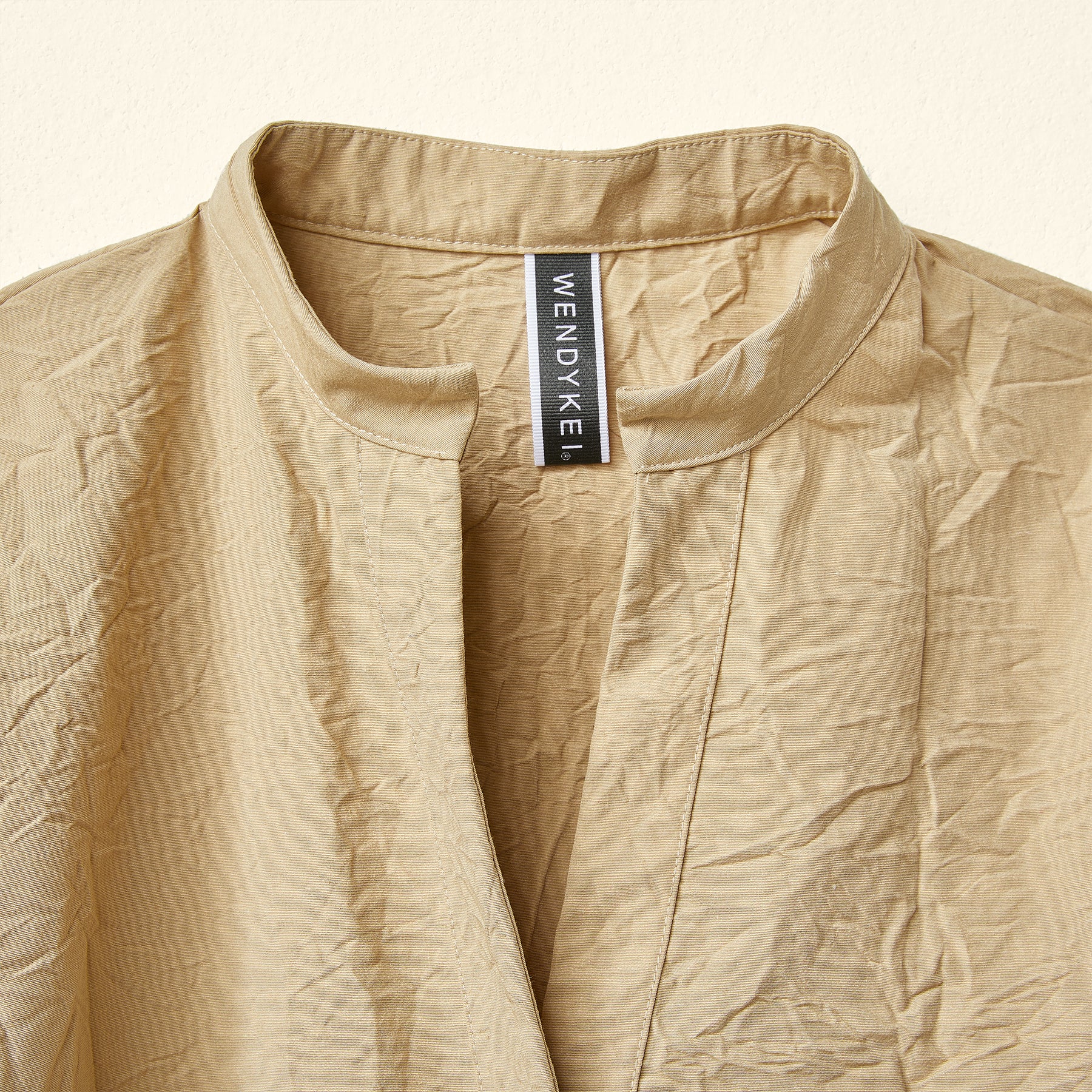 JACKET WITH ROUCHE ON THE HEM