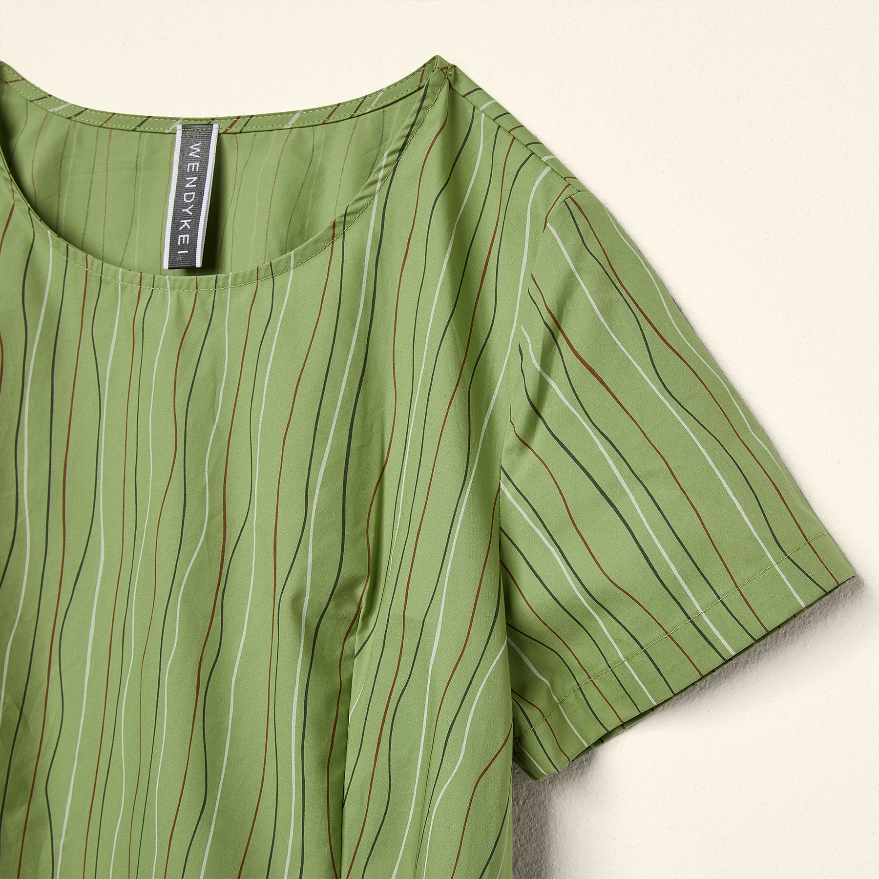 DRESS IN WAVY PINSTRIPES FABRIC