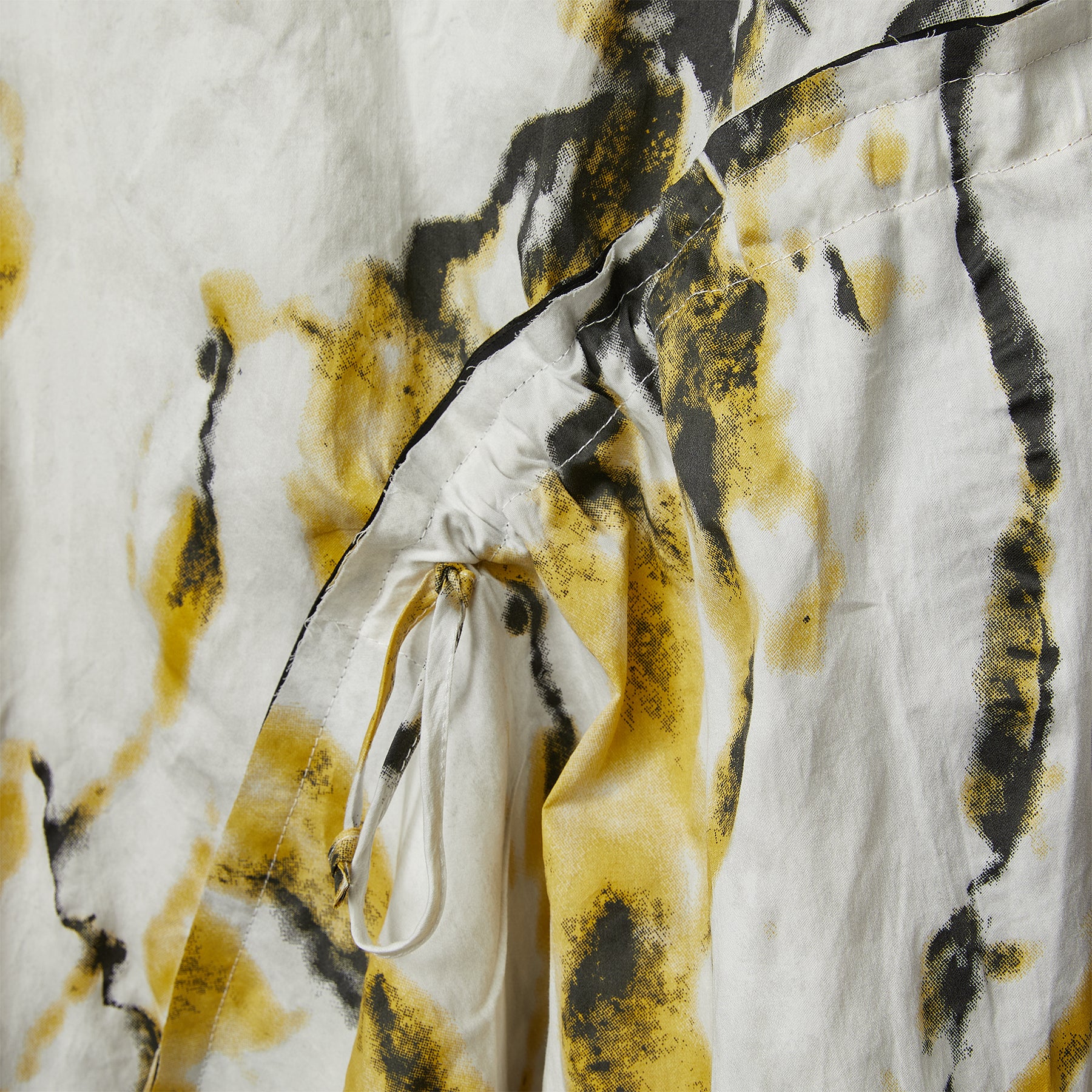 ASYMMETRIC TOP WITH YELLOW FLOWERS