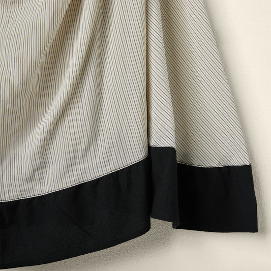 DRAPED SKIRT IN STRIPED FABRIC