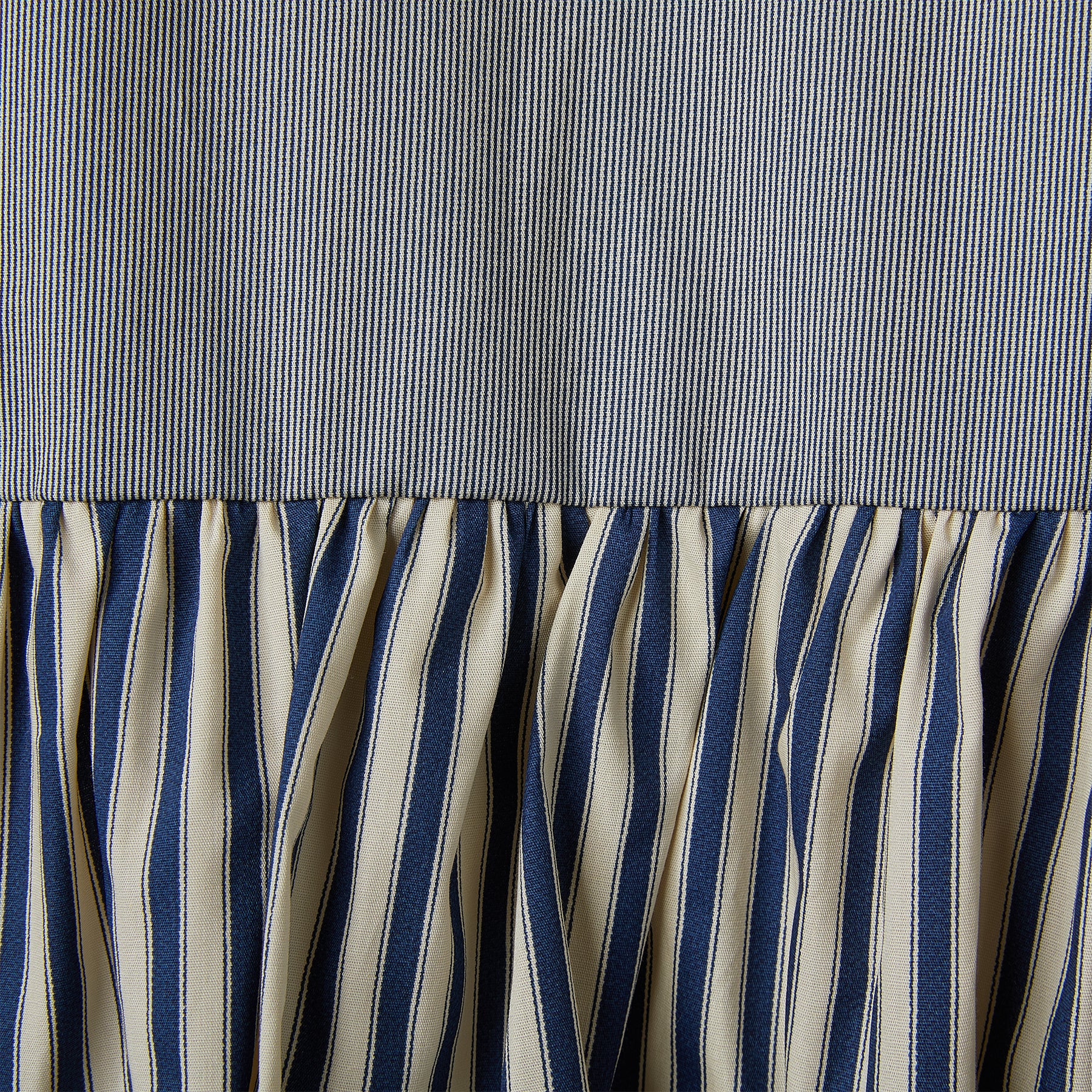 STRIPED DRESS WITH RUFFLE