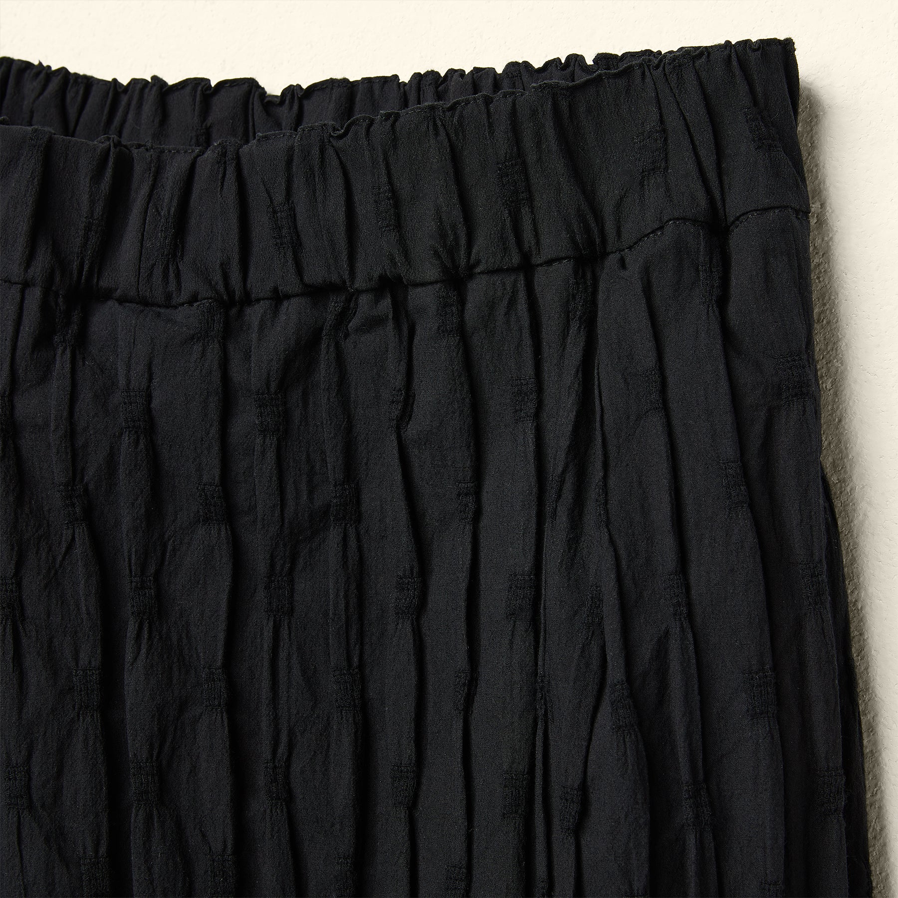 ELABORATED FABRIC TROUSERS