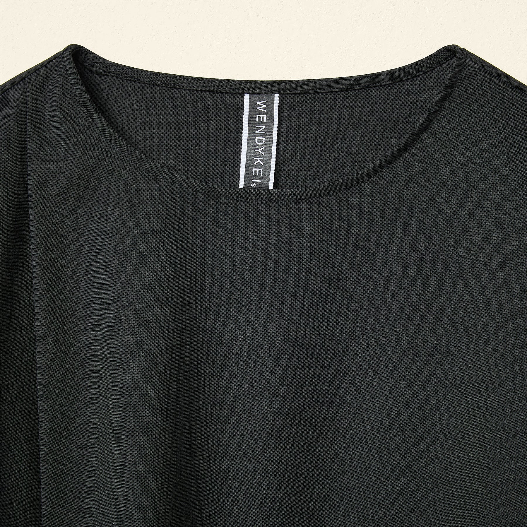 DRESS WITH DECORATIVE BUTTON CLOSURE