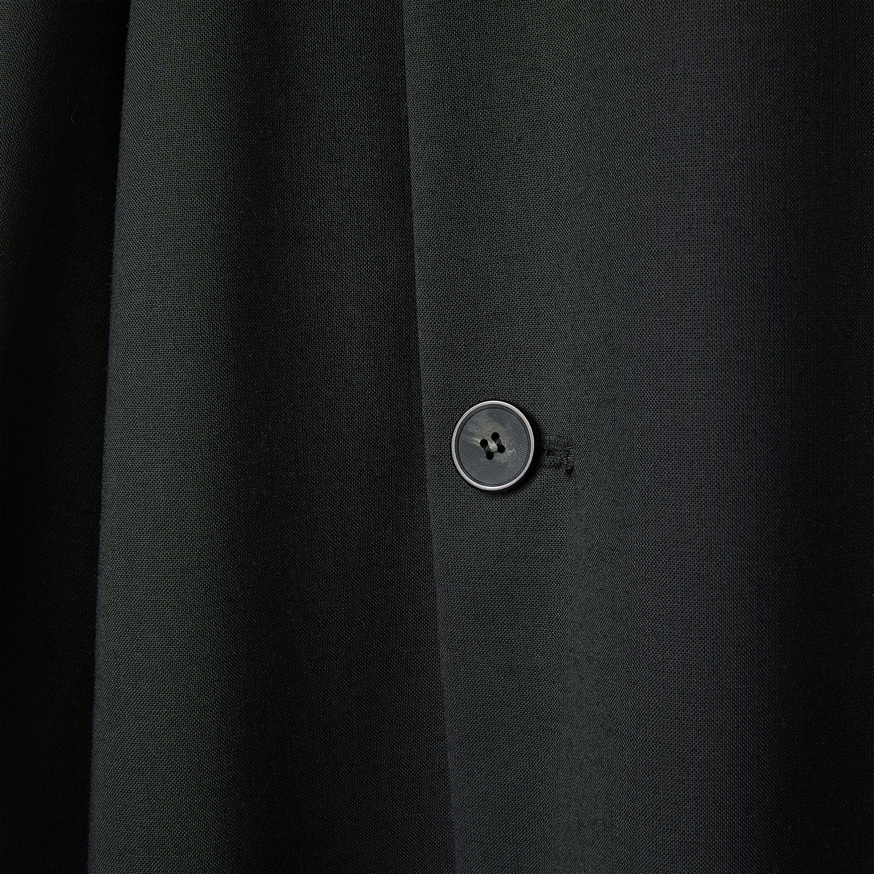 DRESS WITH DECORATIVE BUTTON CLOSURE