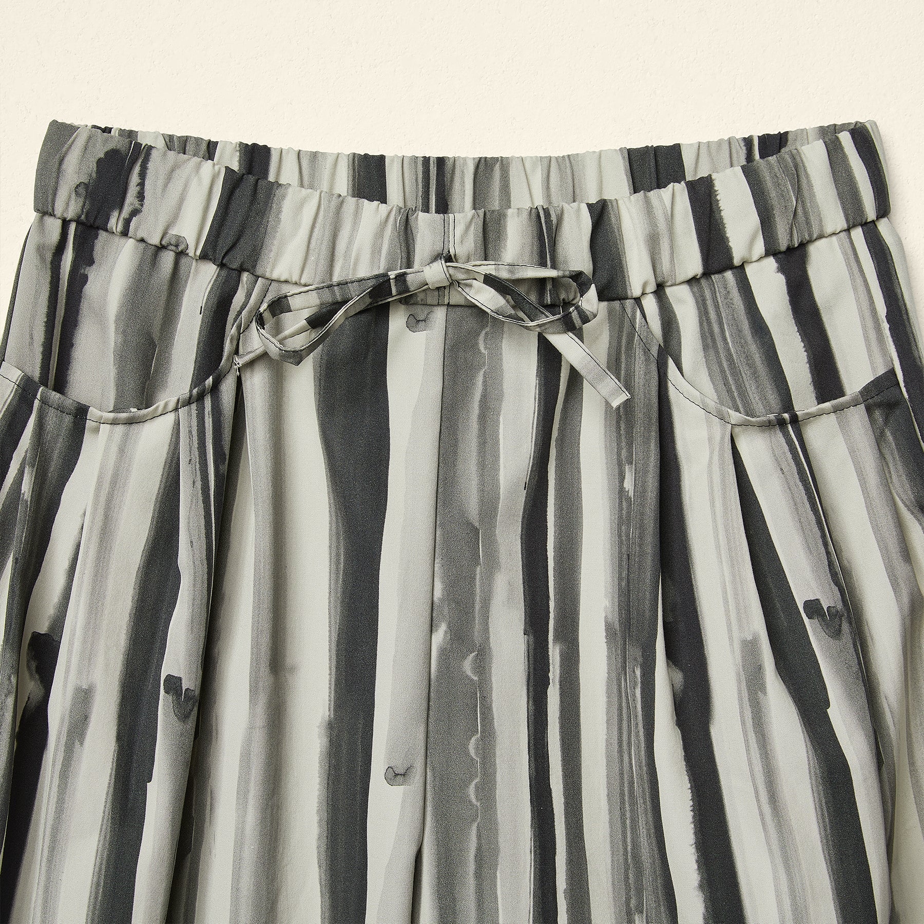 TROUSERS IN BRUSHSTROKE STRIPES PRINT