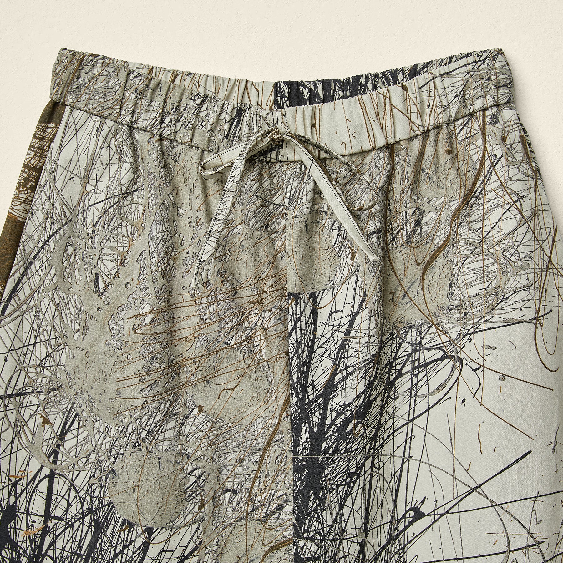 URBAN SCRIBBLE COTTON TROUSERS