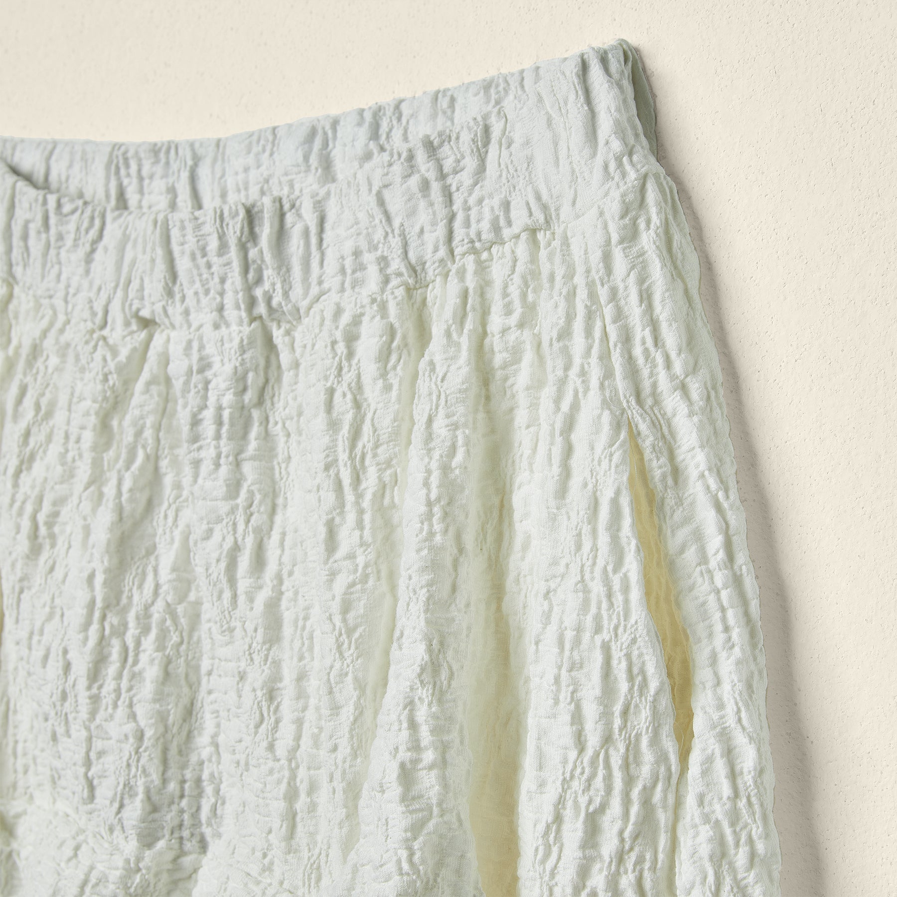 EMBOSSED LOW CROTCH PANTS