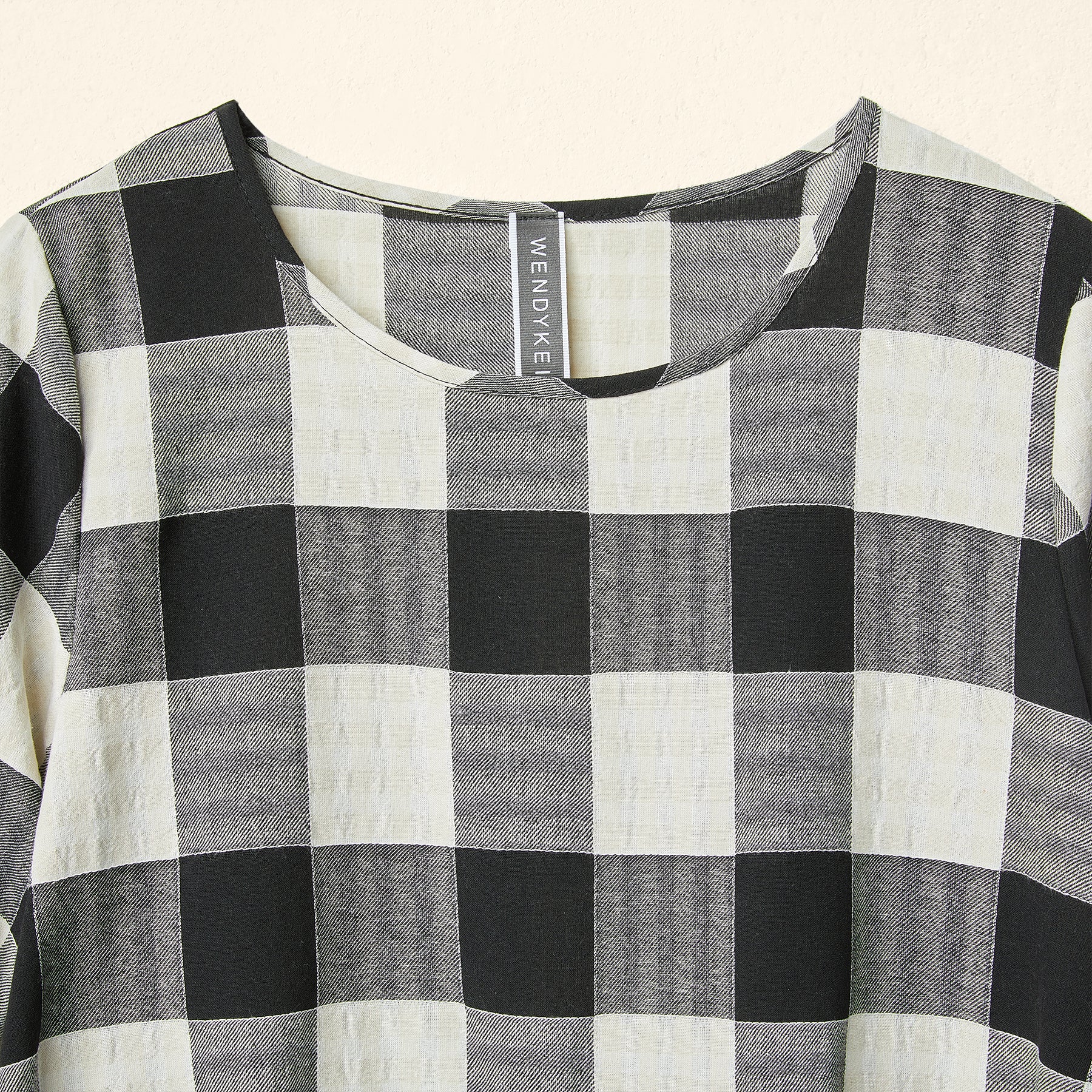 CHECKED DRESS WITH OVAL PLEAT