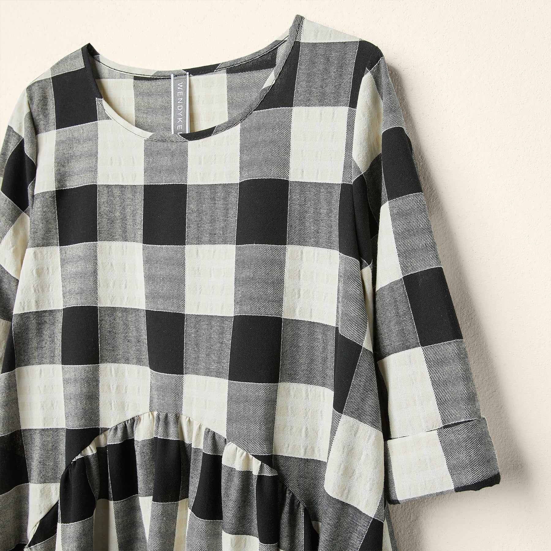 CHECKED DRESS WITH OVAL PLEAT