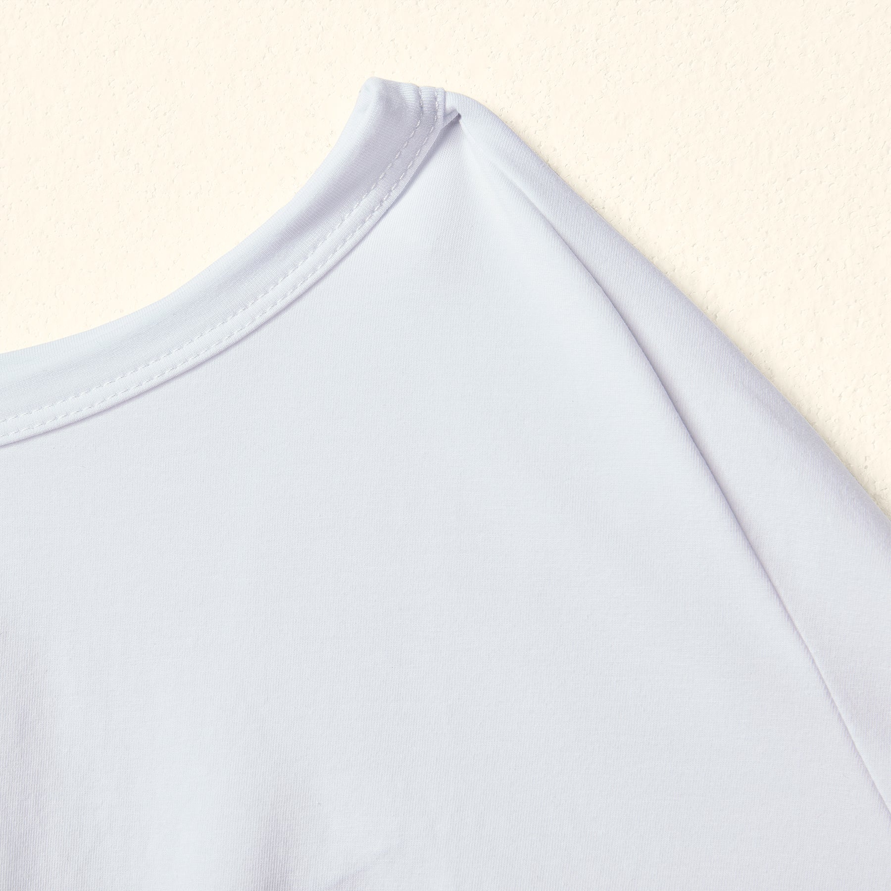 WIDE JERSEY T-SHIRT WITH ASYMMETRIC HEM