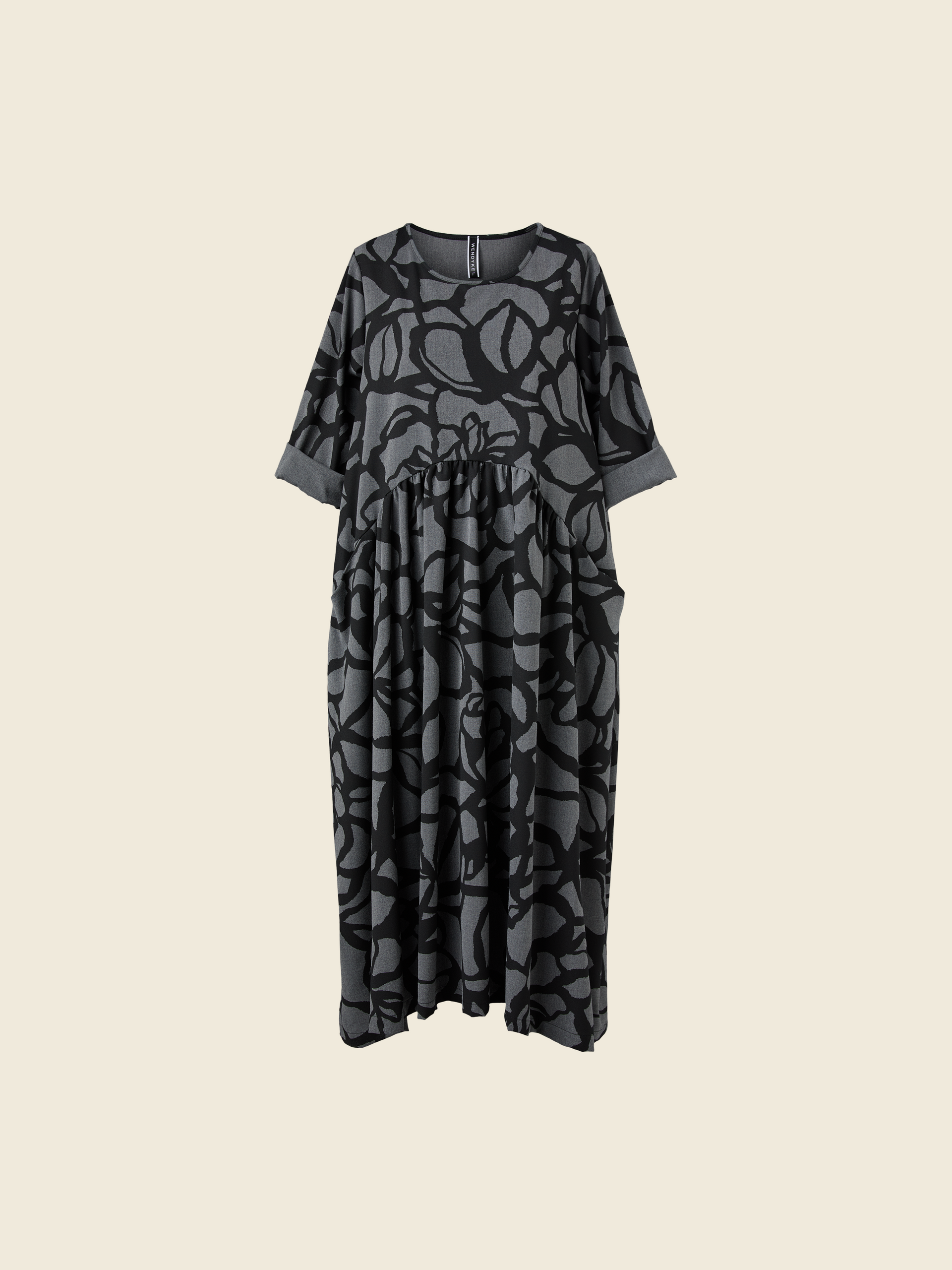 DRESS WITH PLEATS IN PRINTED FABRIC