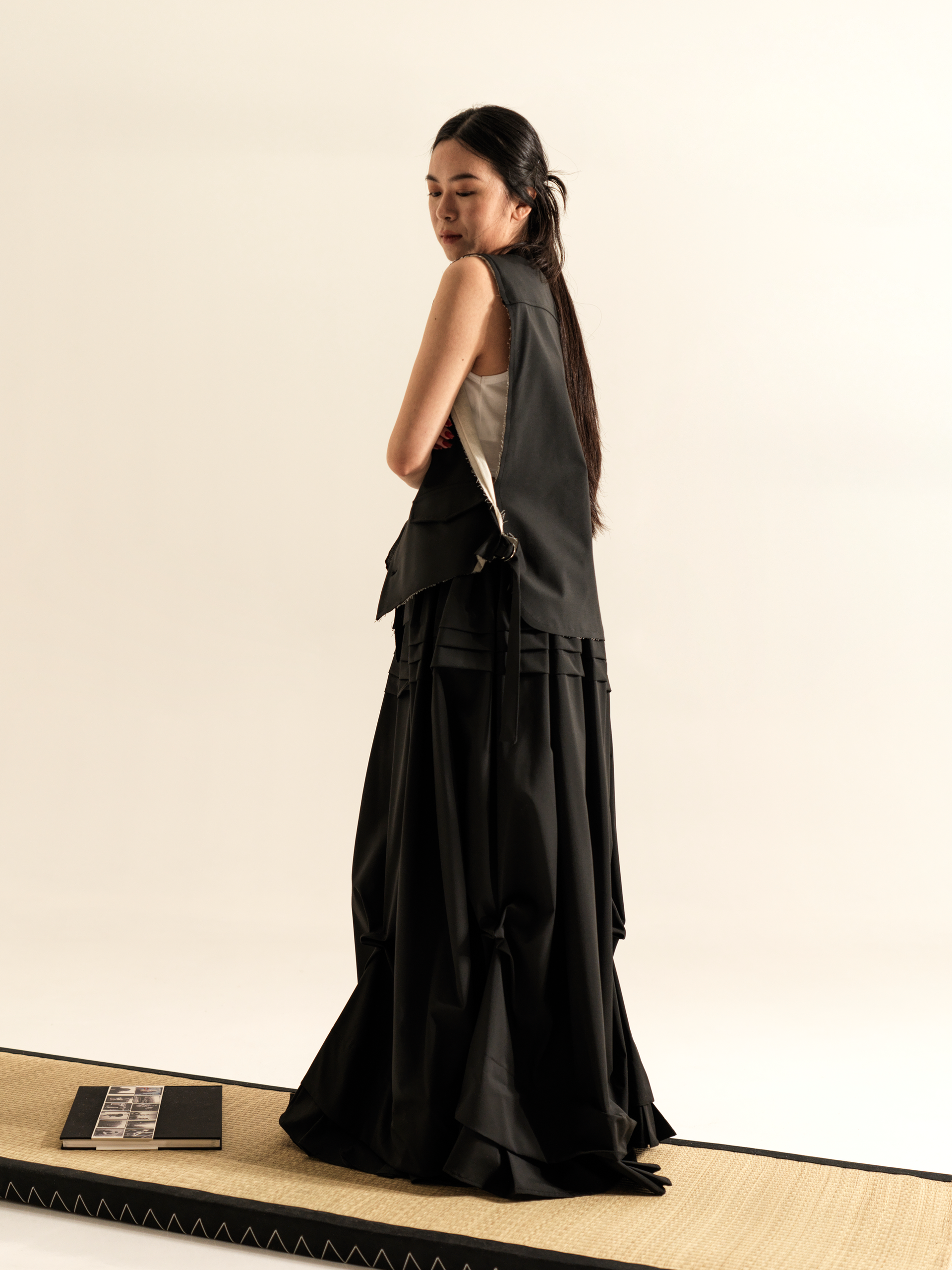 LONG SKIRT WITH SIDE DRAPING AND PLATED RUFFLE HEM