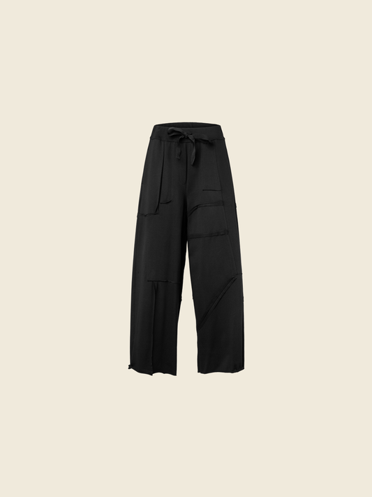 PALAZZO SWEATPANTS WITH RAW CUT SEAMS