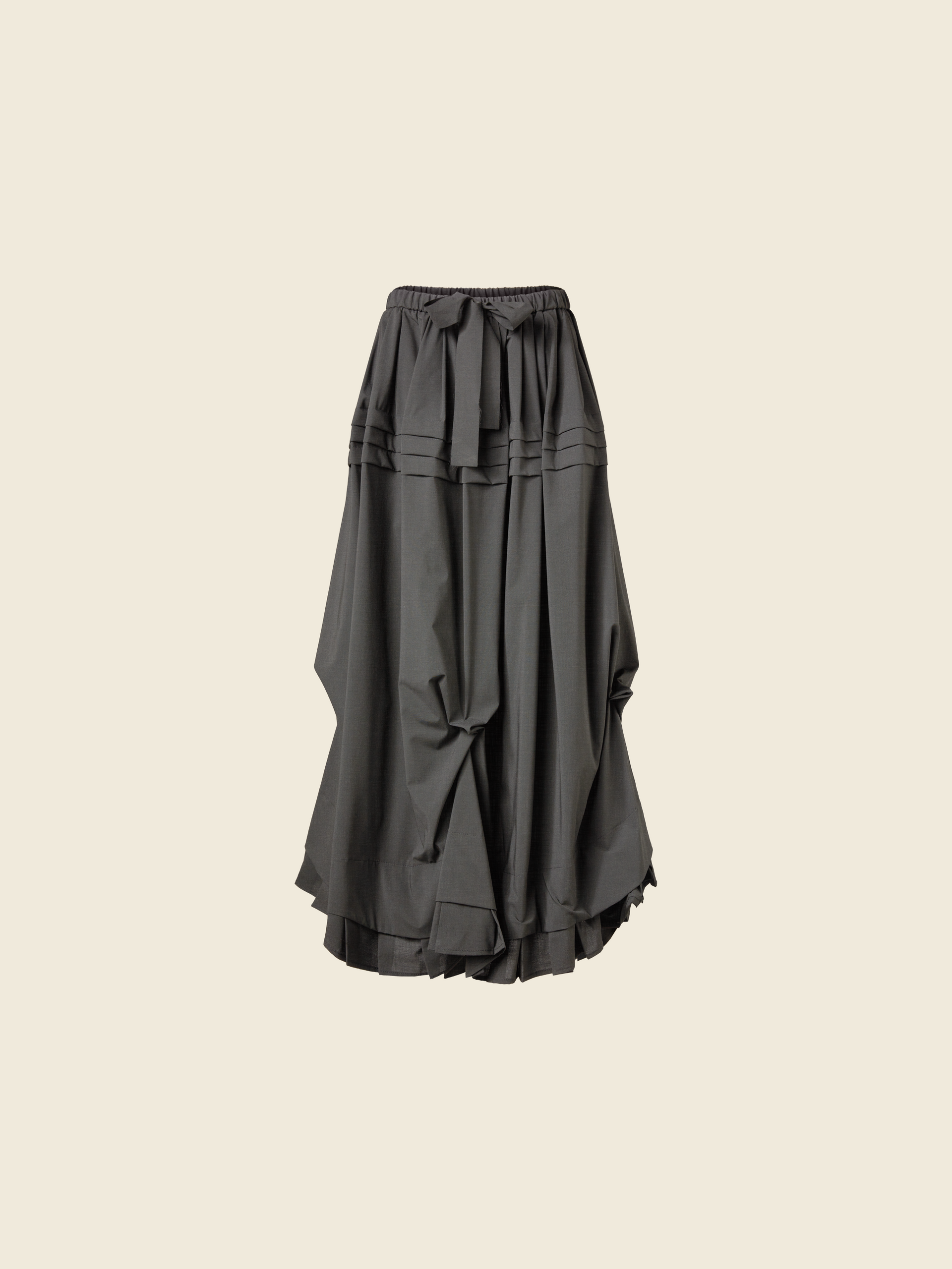 LONG SKIRT WITH SIDE DRAPING AND PLATED RUFFLE HEM