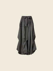 LONG SKIRT WITH SIDE DRAPING AND PLATED RUFFLE HEM