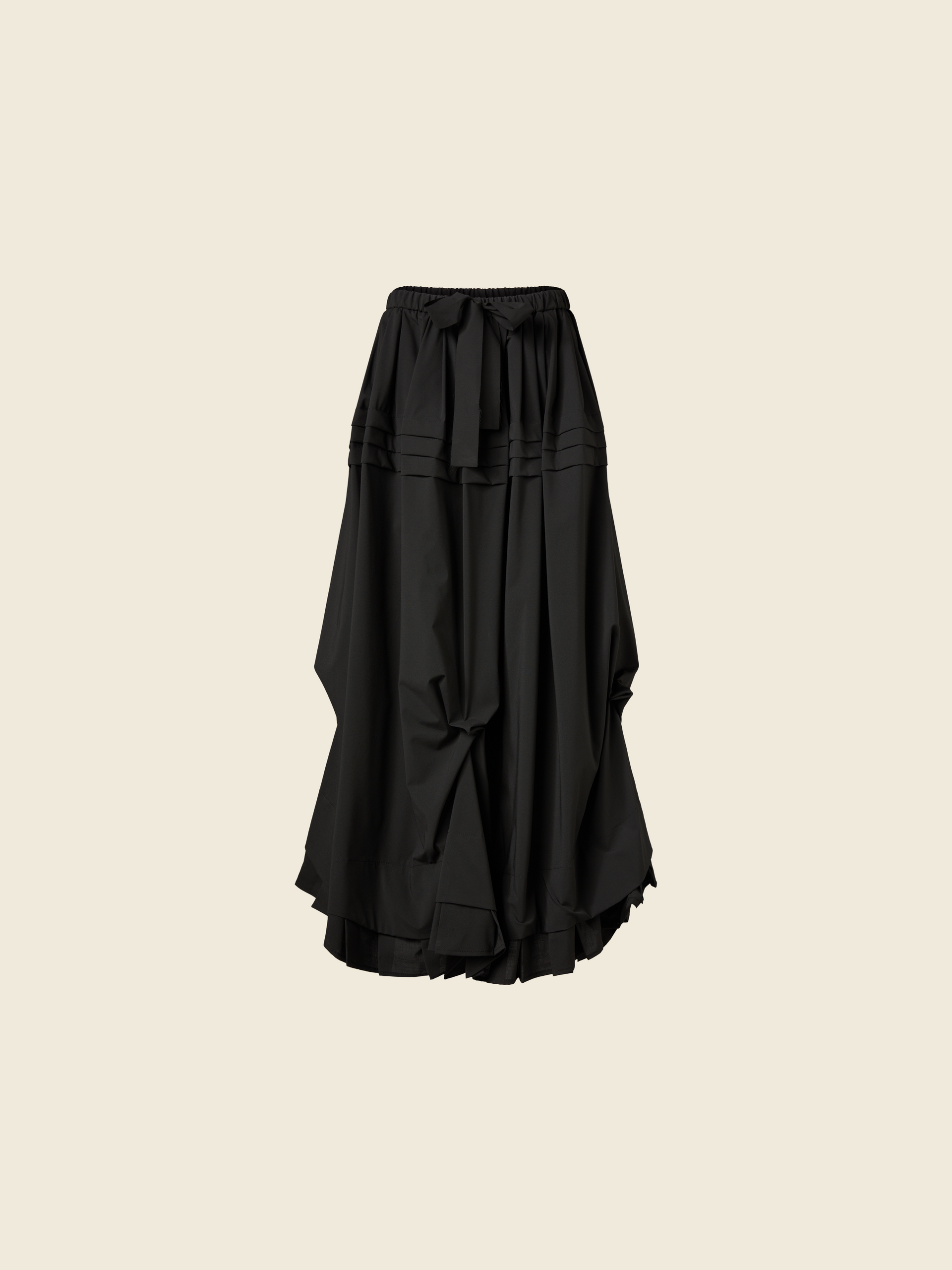 LONG SKIRT WITH SIDE DRAPING AND PLATED RUFFLE HEM