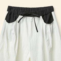 TROUSERS WITH CONTRASTING ELASTIC WAISTBAND