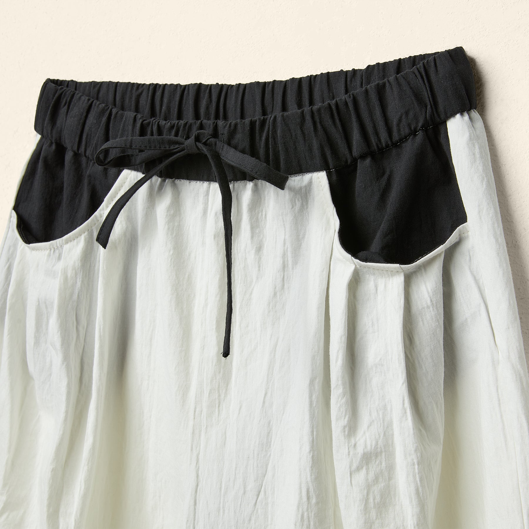 TROUSERS WITH CONTRASTING ELASTIC WAISTBAND