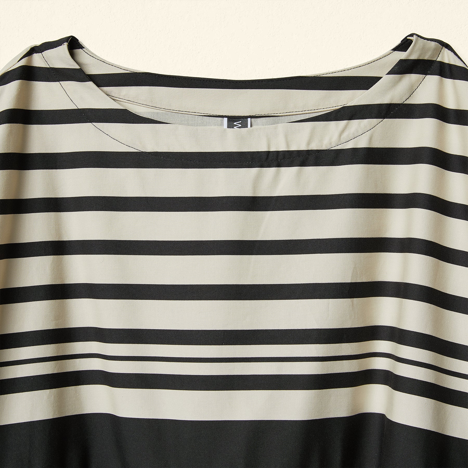 DRESS IN IRREGULAR STRIPED FABRIC