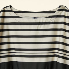 DRESS IN IRREGULAR STRIPED FABRIC