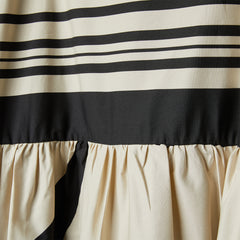 DRESS IN IRREGULAR STRIPED FABRIC