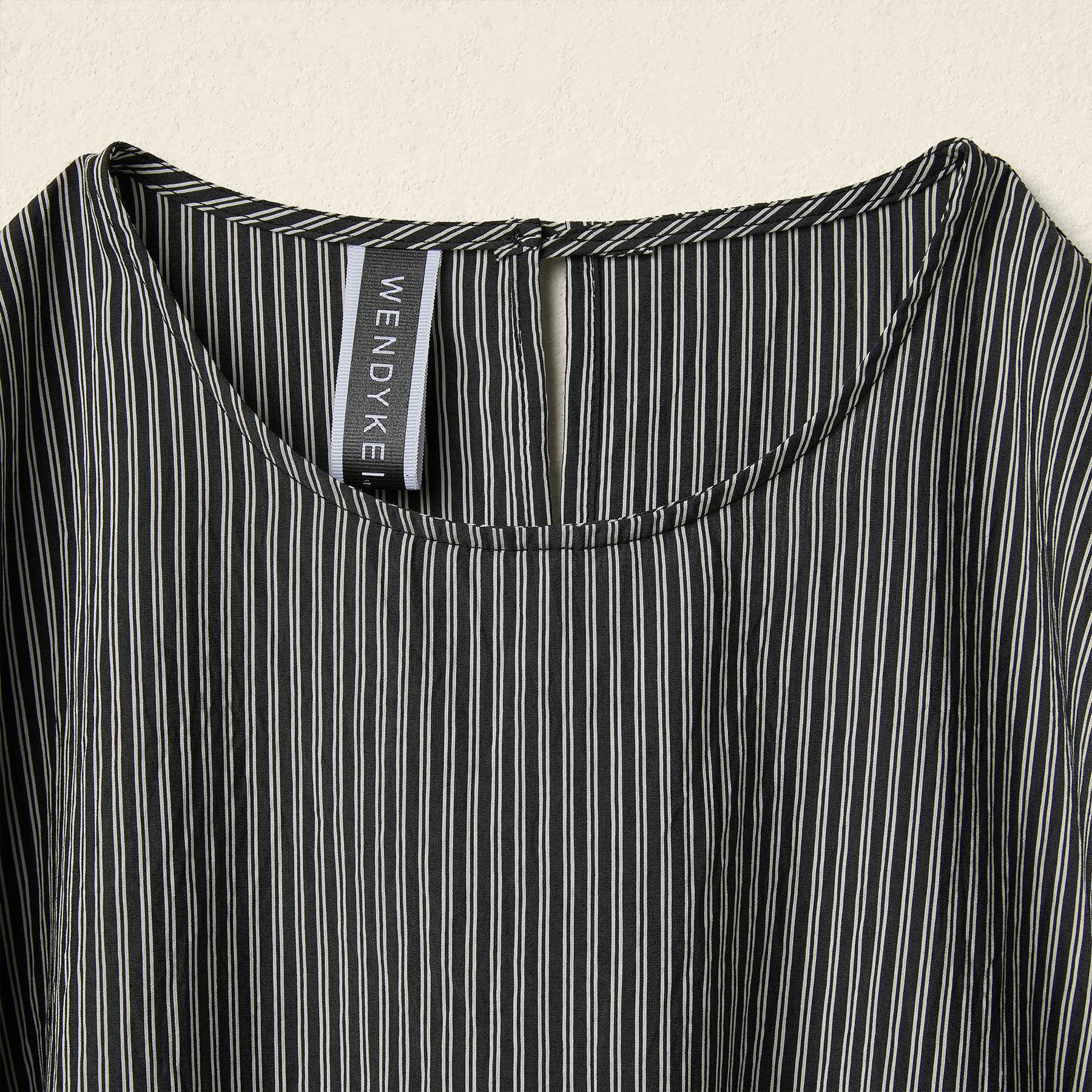 BLUSA A RIGHE CON PIEGHE