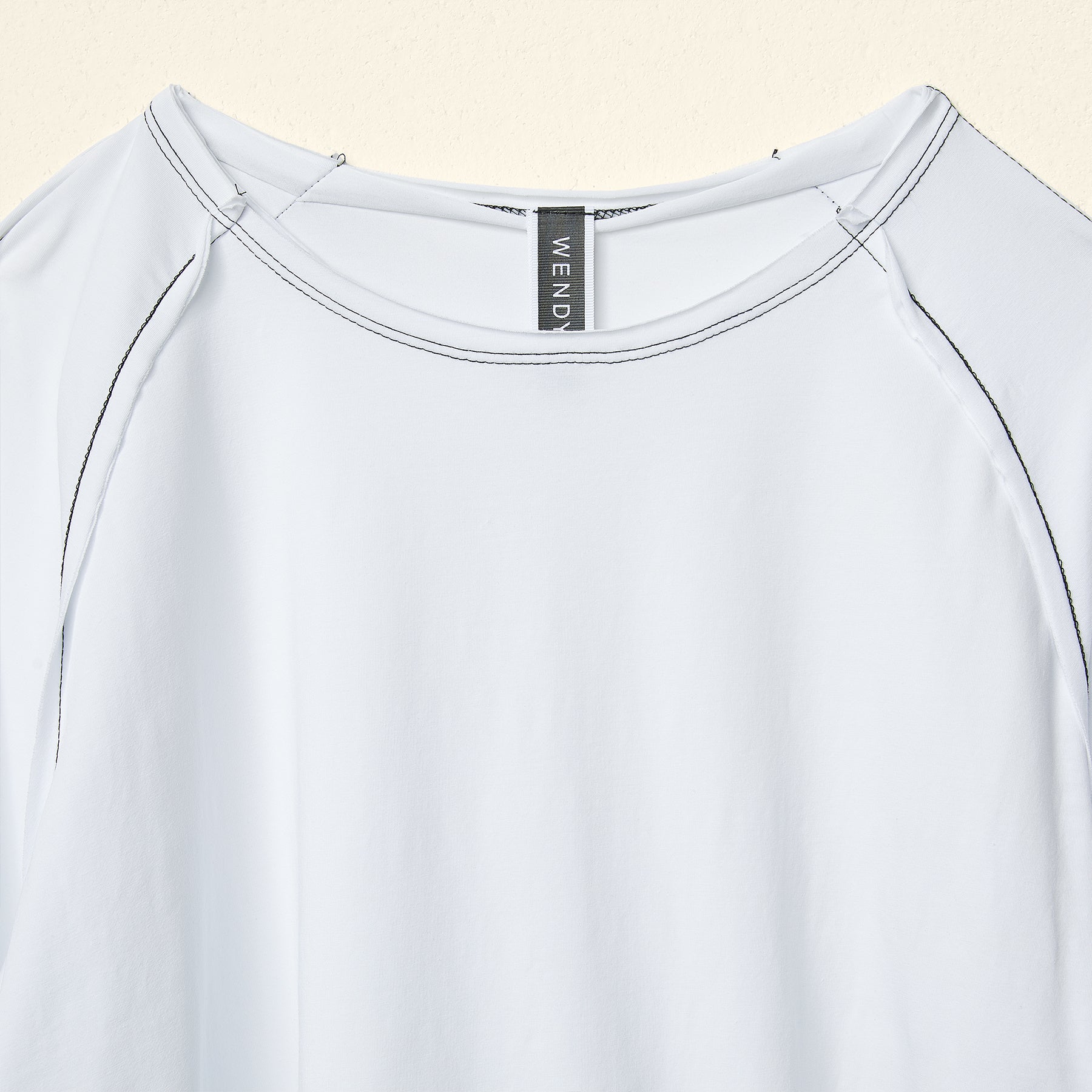 BLUSA IN JERSEY CON ORLI A RIGHE