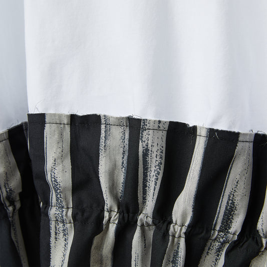 BLUSA IN JERSEY CON ORLI A RIGHE