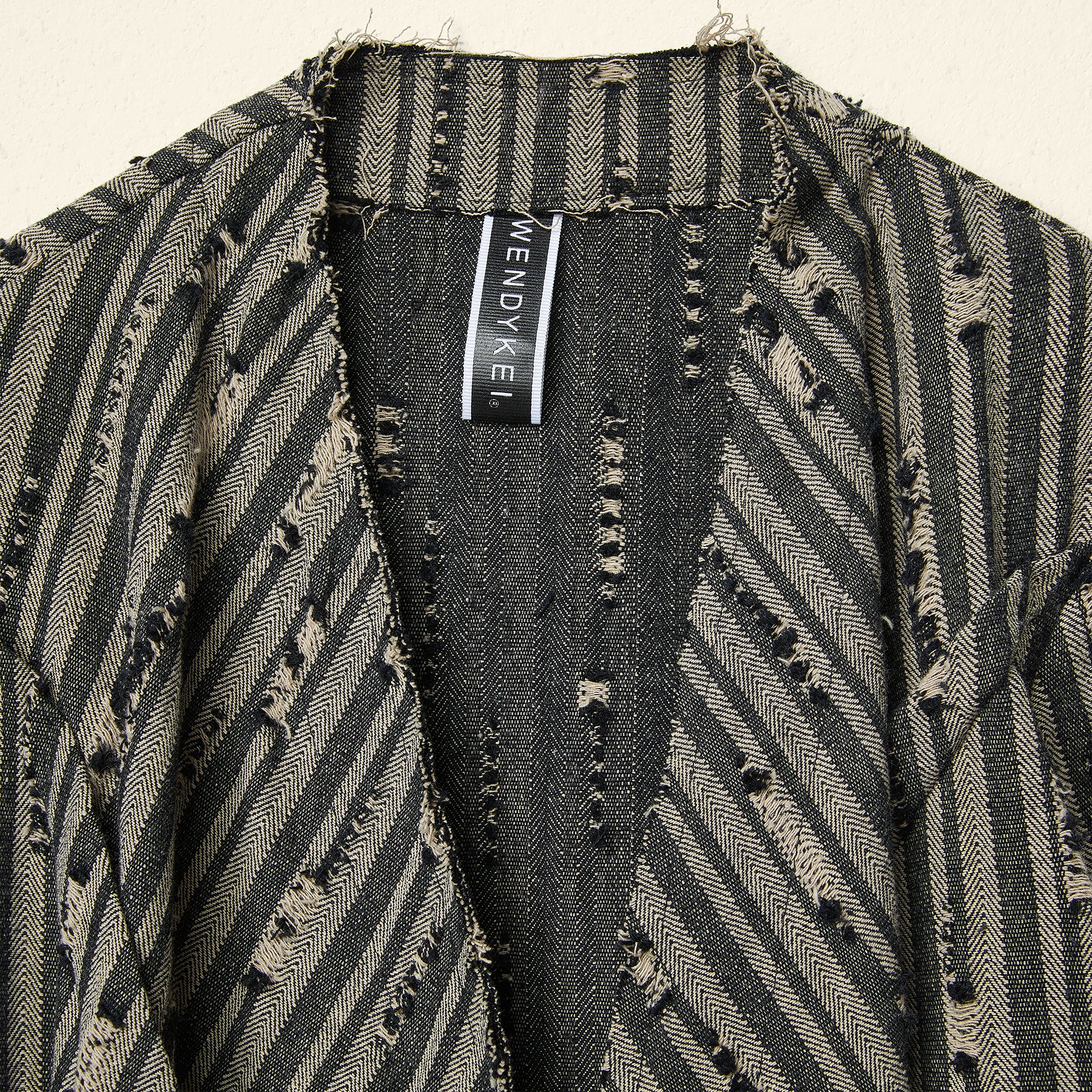 CARDIGAN IN TESSUTO SPIGATO STRAPPATO