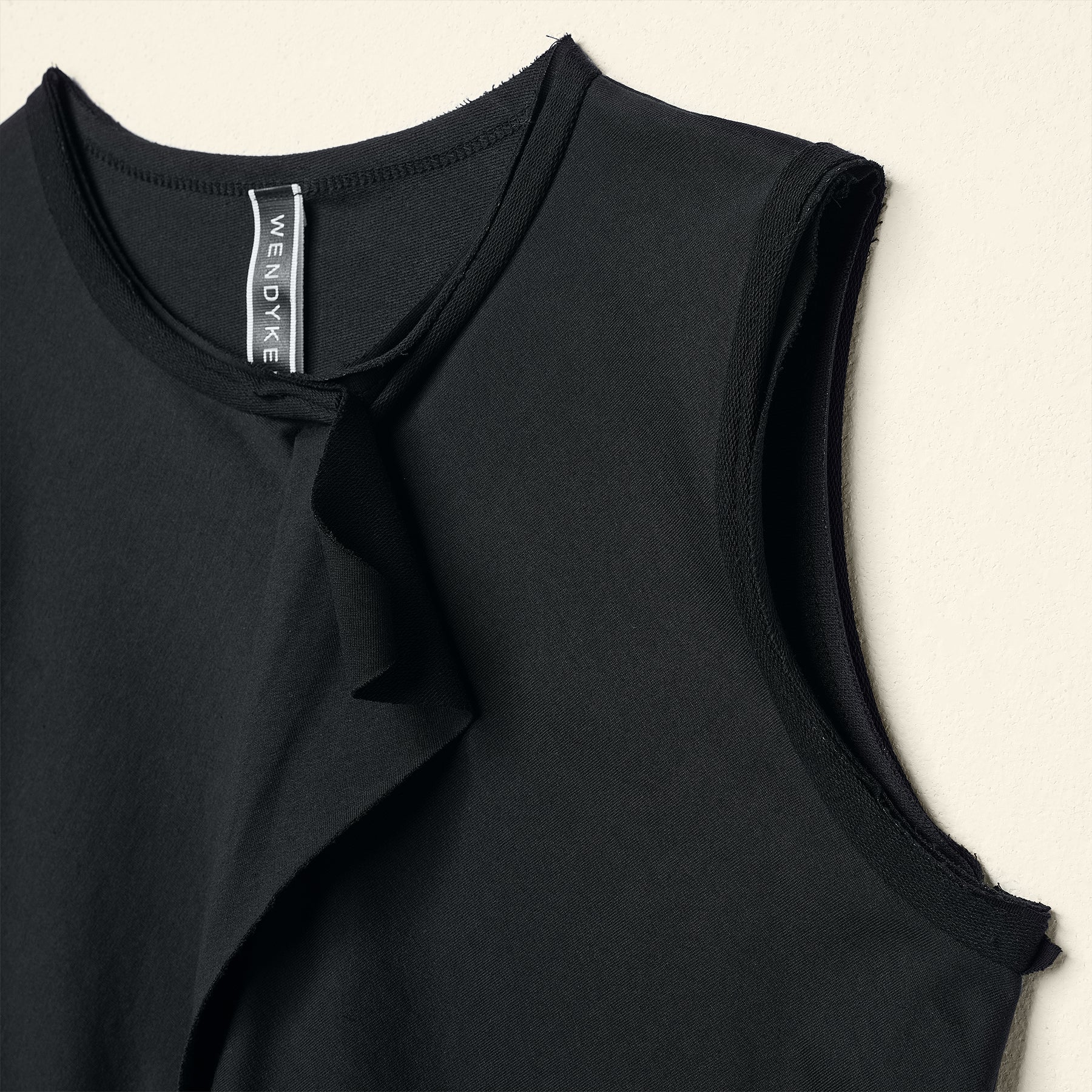 TOP CON SPACCO FRONTALE