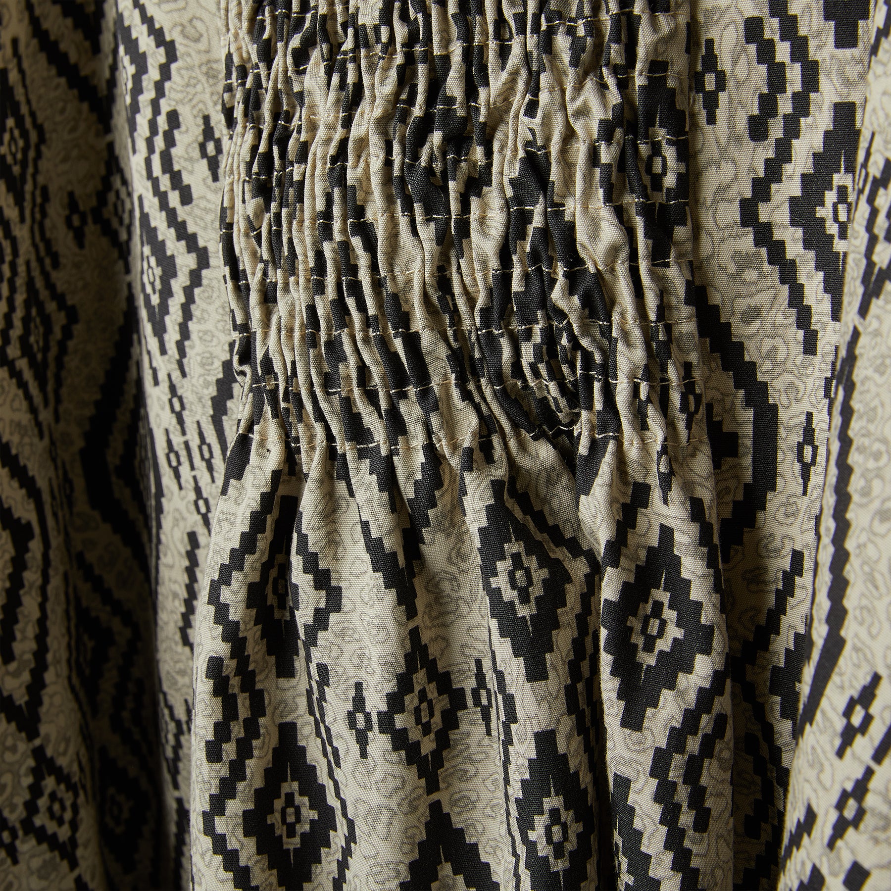 GATHERED BLOUSE IN GEOMETRIC PATTERN