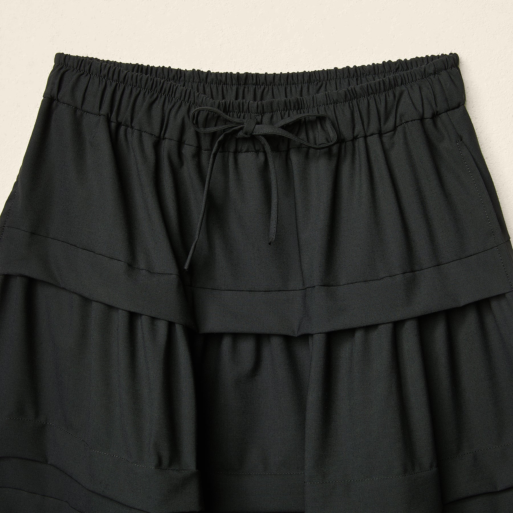 AW26 PLEATED LONG SKIRT