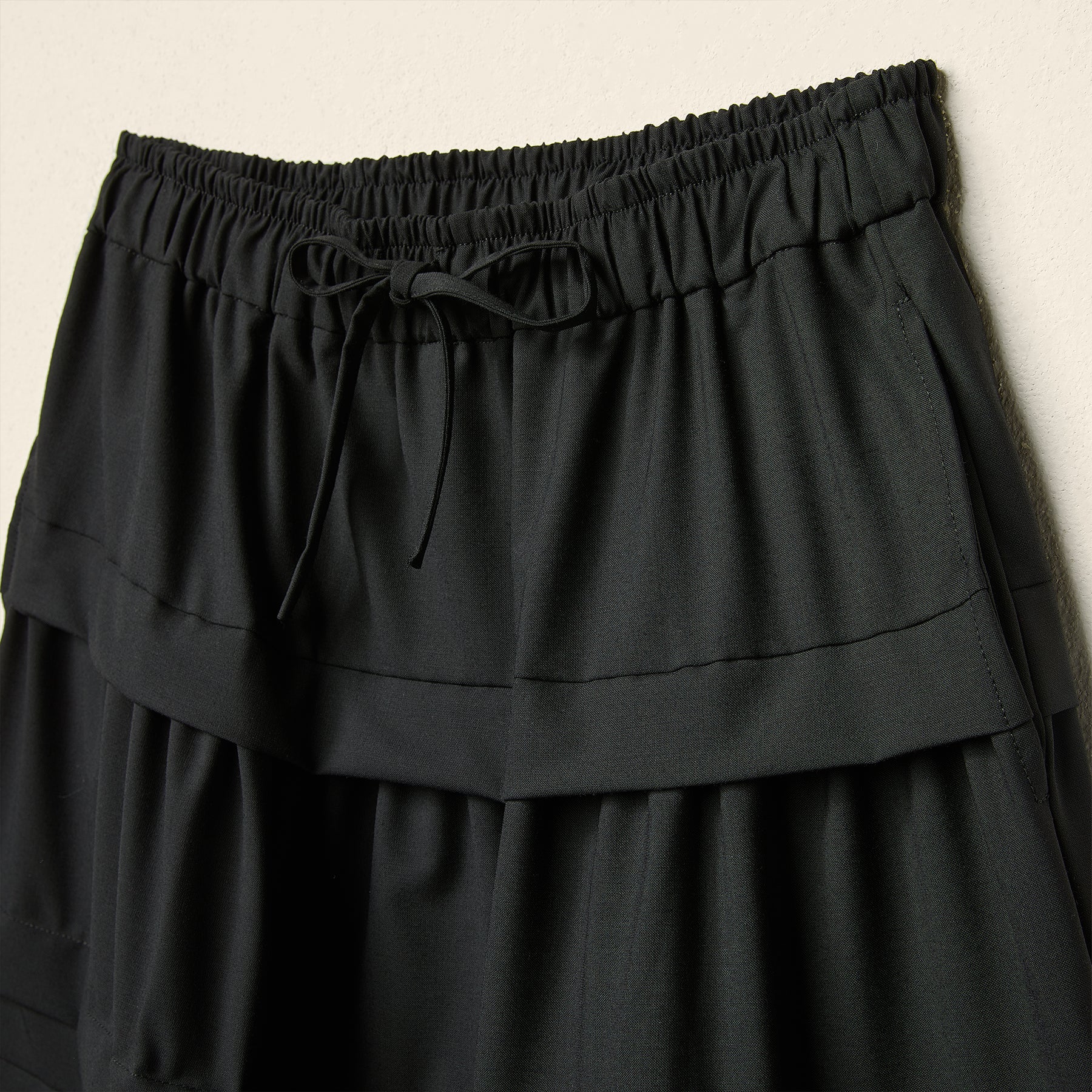AW26 PLEATED LONG SKIRT