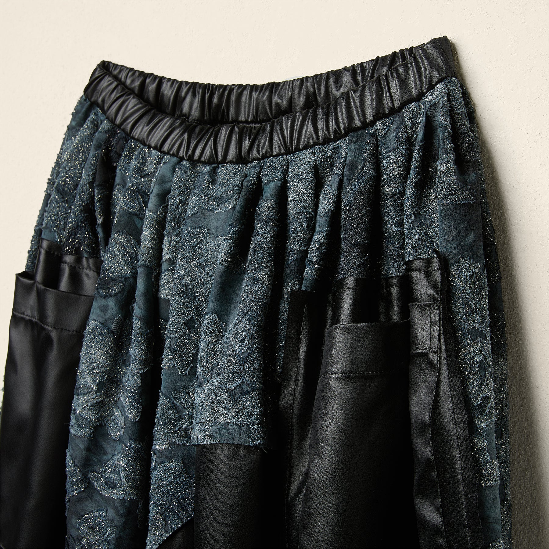 AW26 FAUX LEATHER SKIRT WITH JACQUARD DETAIL