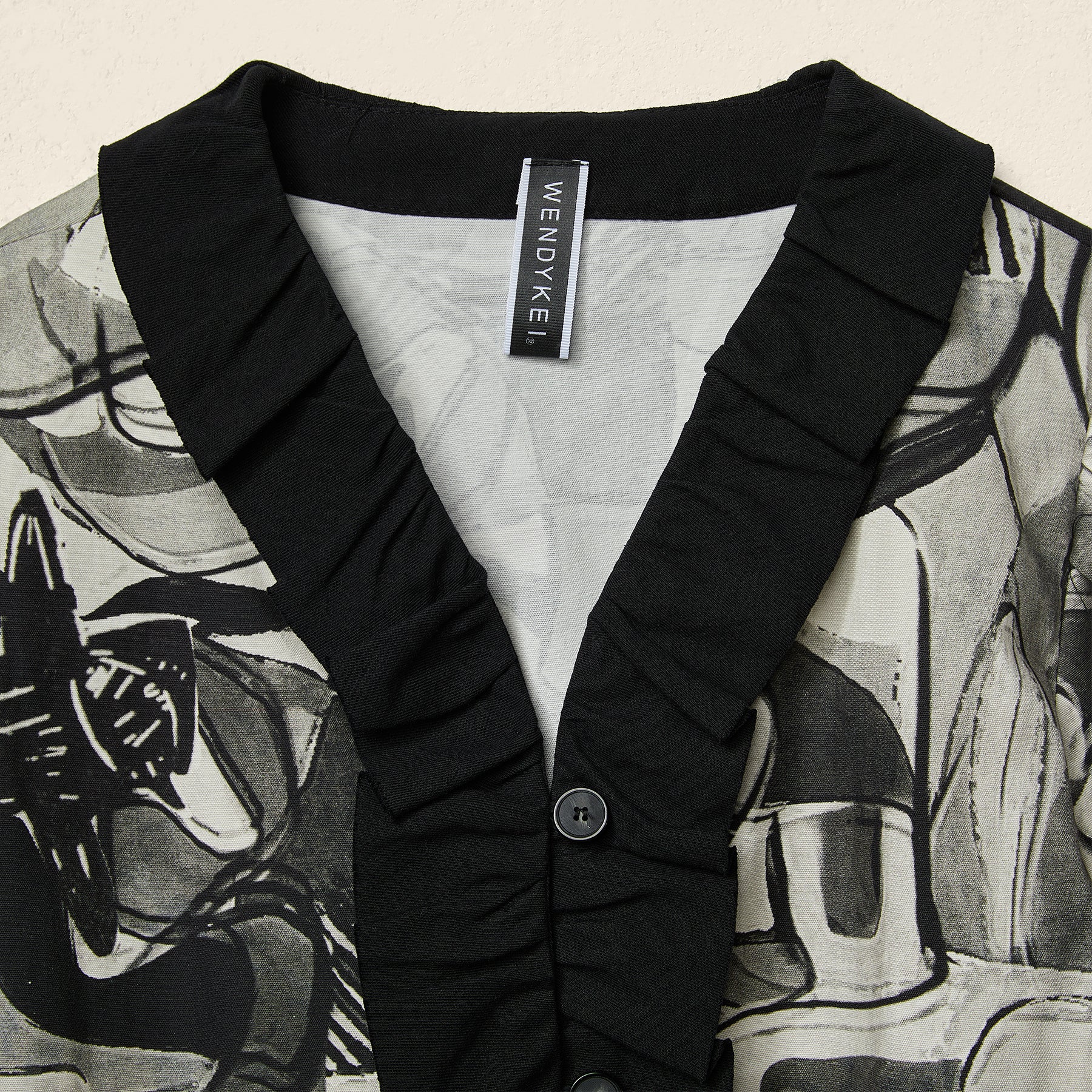 ABSTRACT PRINT JACKET WITH ROUCHE