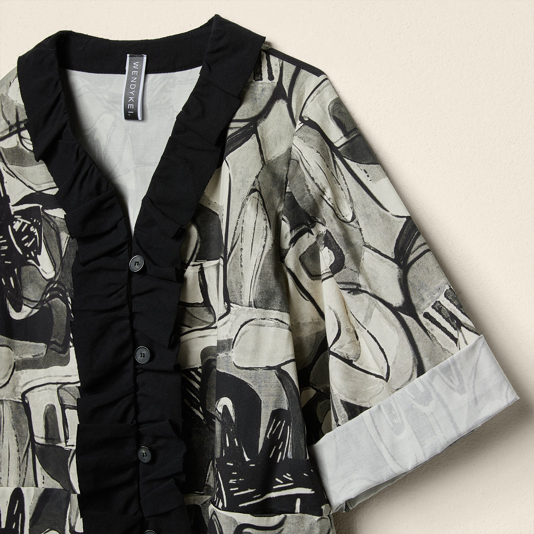 ABSTRACT PRINT JACKET WITH ROUCHE