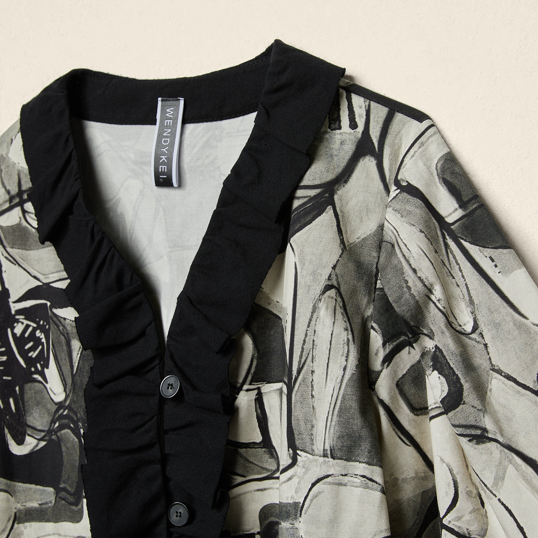 ABSTRACT PRINT JACKET WITH ROUCHE